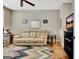 Cozy home office featuring neutral paint and a comfortable couch at 339 Cottonwood Cir, Peachtree City, GA 30269
