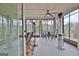 Bright and airy sunroom with large windows, ceiling fan, and outdoor views at 339 Cottonwood Cir, Peachtree City, GA 30269