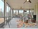 Spacious sunroom with large windows and multiple seating arrangements at 339 Cottonwood Cir, Peachtree City, GA 30269