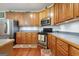 Well-equipped kitchen featuring stainless steel appliances and ample cabinet space at 260 Millbrook Village Dr, Tyrone, GA 30290
