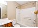 Bathroom featuring tile, neutral walls, and a shower and bath at 5797 Strathmoor Manor Cir, Lithonia, GA 30058