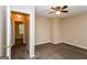 Bedroom featuring carpet, neutral walls and a doorway to another room at 5797 Strathmoor Manor Cir, Lithonia, GA 30058