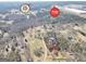 Aerial view showcasing the property's proximity to the Tanger Outlets and the City of Locust Grove at 74 Price W Dr, Locust Grove, GA 30248