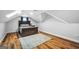 Bedroom featuring wood floors and a skylight at 74 Price W Dr, Locust Grove, GA 30248