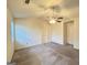 Bedroom with neutral carpet, ceiling fan and ample closet space at 3750 Greenbrook Dr, Douglasville, GA 30135