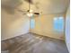 Bright bedroom features a ceiling fan, neutral carpet, and natural light at 3750 Greenbrook Dr, Douglasville, GA 30135