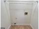 Empty laundry room with a wire shelf and hook ups for a washer and dryer at 3750 Greenbrook Dr, Douglasville, GA 30135