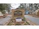 Community sign with a lush landscape at 905 Pine Tree Trl, South Fulton, GA 30349