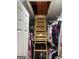 Attic access via a wood ladder in the closet at 24 Picketts Mill Pl, Acworth, GA 30101