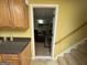 Doorway view of finished basement area with carpet, leather recliner, and TV at 24 Picketts Mill Pl, Acworth, GA 30101