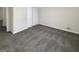 This bedroom has new gray carpet and fresh white paint, with a large closet for storage at 1280 Pinyon Pl, Lawrenceville, GA 30043
