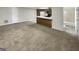 Basement area with a partial kitchen, and a full bathroom, and ample living space at 1280 Pinyon Pl, Lawrenceville, GA 30043