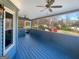 Inviting screened porch featuring ceiling fans and providing a relaxing outdoor living space at 1280 Pinyon Pl, Lawrenceville, GA 30043