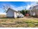 Exterior view of a house with a large backyard, perfect for entertaining at 550 Stateline Rd, Bowdon, GA 30108