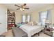 A peaceful bedroom with a large bed, ample natural light, and a cozy atmosphere at 550 Stateline Rd, Bowdon, GA 30108