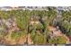 Aerial view of a home with mature trees and an extra long driveway at 160 Pine Trail Rd, Fayetteville, GA 30214