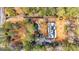 Overhead aerial shot of the property showing the structure and the perimeter trees at 160 Pine Trail Rd, Fayetteville, GA 30214