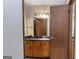 Bathroom featuring a vanity, a marble countertop, and a door at 160 Pine Trail Rd, Fayetteville, GA 30214