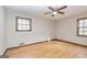 Bright bedroom with hardwood floors and natural light from windows at 160 Pine Trail Rd, Fayetteville, GA 30214