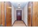 Inviting foyer with hardwood floors, a stylish front door, and doorway leading to the main living space at 160 Pine Trail Rd, Fayetteville, GA 30214