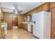 Fully-equipped kitchen featuring a modern refrigerator and an open layout to the dining room at 160 Pine Trail Rd, Fayetteville, GA 30214