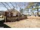 Charming backyard featuring a well-maintained lawn and privacy fence at 1800 Stockton Walk Ln, Snellville, GA 30078