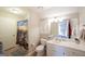 Bright bathroom featuring a shower, vanity with ample storage, and modern fixtures for convenience at 1800 Stockton Walk Ln, Snellville, GA 30078
