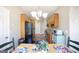 Bright kitchen area with eat-in dining and wood cabinets at 1800 Stockton Walk Ln, Snellville, GA 30078