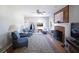Bright living room with a brick fireplace at 1800 Stockton Walk Ln, Snellville, GA 30078