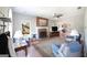 Spacious living room with a brick fireplace and hardwood floors at 1800 Stockton Walk Ln, Snellville, GA 30078