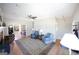 Bright living room featuring a ceiling fan and sliding door at 1800 Stockton Walk Ln, Snellville, GA 30078