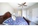 Spacious main bedroom featuring ceiling fan, sleigh bed, and an ensuite bathroom at 1800 Stockton Walk Ln, Snellville, GA 30078