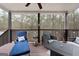 Relaxing deck with outdoor furniture and a view of the wooded backyard at 172 Sam Solomon Rd, Locust Grove, GA 30248