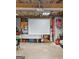Garage with projector screen and workspace, perfect for hobbies and entertainment at 172 Sam Solomon Rd, Locust Grove, GA 30248