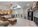A Gathering room that opens to the kitchen has lots of light through the french doors at 172 Sam Solomon Rd, Locust Grove, GA 30248