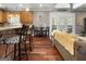 A kitchen and living room with lots of natural light flowing through a set of beautiful french doors at 172 Sam Solomon Rd, Locust Grove, GA 30248