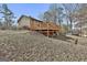 Backyard view showcasing a spacious deck area, perfect for enjoying outdoor living and entertaining guests at 439 Elder St, Fairburn, GA 30213