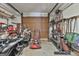 Well-organized garage space with lawn equipment, tools, and ample storage, maximizing functionality at 439 Elder St, Fairburn, GA 30213