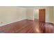 Cozy bedroom with hardwood floors and a door, offering privacy at 434 Lees Lake Rd, Fayetteville, GA 30214