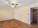 Bedroom with hardwood floors and neutral paint at 434 Lees Lake Rd, Fayetteville, GA 30214