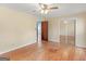 Bedroom with hardwood floors and large mirrored closet at 434 Lees Lake Rd, Fayetteville, GA 30214