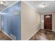 Spacious foyer featuring an arched doorway leading to the living room with attractive tile flooring at 434 Lees Lake Rd, Fayetteville, GA 30214