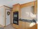 View of the kitchen featuring wooden cabinets and stainless steel appliances at 434 Lees Lake Rd, Fayetteville, GA 30214