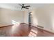 Cozy living room featuring hardwood floors and a ceiling fan at 434 Lees Lake Rd, Fayetteville, GA 30214