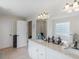 Bright bathroom with double vanity, granite countertop, and plenty of natural light at 2110 Mcgarity Rd, Mcdonough, GA 30252