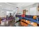 Inviting living space with dining area, large sectional, and hardwood floors at 2405 Hillside Ave, Decatur, GA 30032