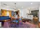 Bright open-concept living space features a dining area and modern kitchen at 2405 Hillside Ave, Decatur, GA 30032