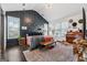 Large bedroom with custom accent wall, bench, and a bright window with a view into the back yard at 2405 Hillside Ave, Decatur, GA 30032