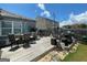 Spacious backyard deck featuring a dining area, grill, and ample space for entertaining at 1687 Blue Heron Way, Hampton, GA 30228