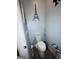 Features a toilet and artwork at 1687 Blue Heron Way, Hampton, GA 30228